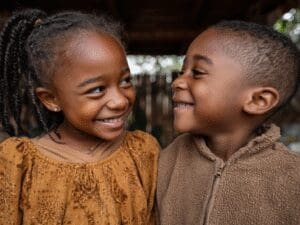 omarohara_a_photorealistic_photo_of_two_siblings_playing_one__752cf781-7807-479a-ae89-8695bd165c19_3 (Large)